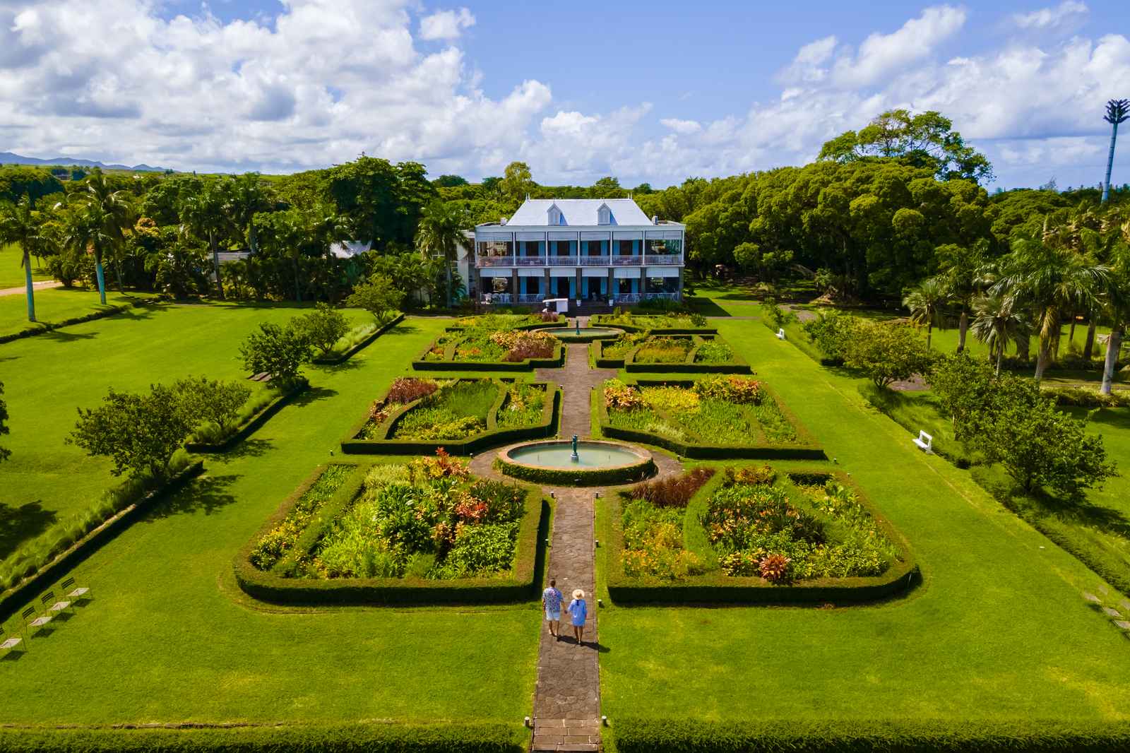 Historic estate with a symmetrical formal garden reflecting its cultural design heritage
